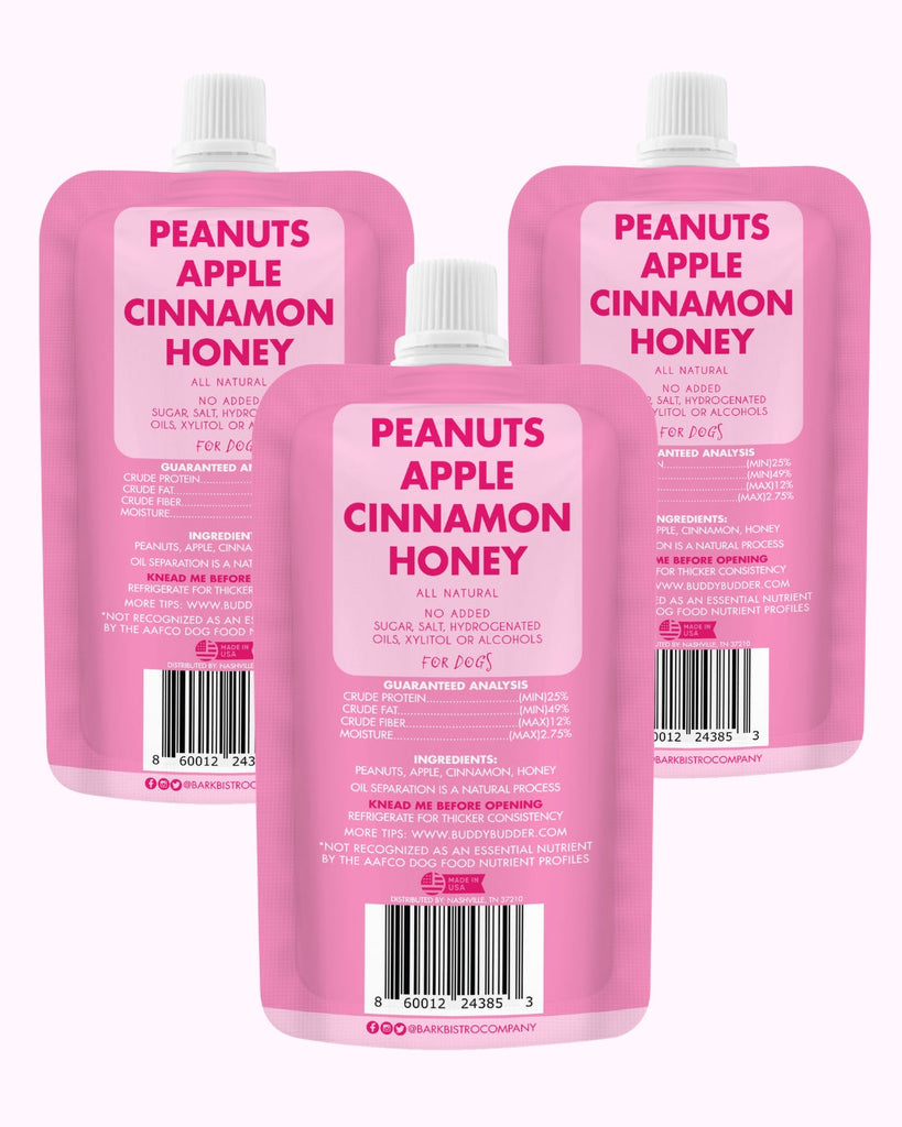 Apple Buddy Budder natural dog peanut butter squeeze packs with peanuts, apple, cinnamon, and honey, made in USA.