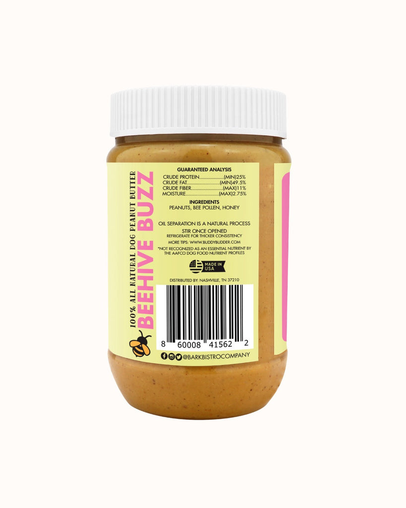 Jar of Beehive Buzz Buddy Budder natural dog peanut butter with peanut, bee pollen, and honey ingredients label