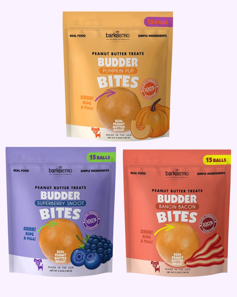 3-pack of Buddy Budder Bites soft peanut butter dog treats in pumpkin, superberry, and bacon flavors, 15 bite-sized balls per pouch for all dog sizes.